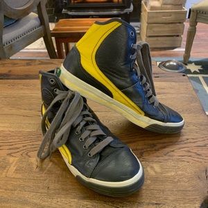 Yellow and black high top P.F. Flyers